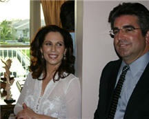 Diana and Dr. John Ortiz ( the firm's General Contractor) socialize with other guests while proudly displaying the office Diana and Dr. John Ortiz ( the firm's General Contractor) socialize with other guests while proudly displaying the office